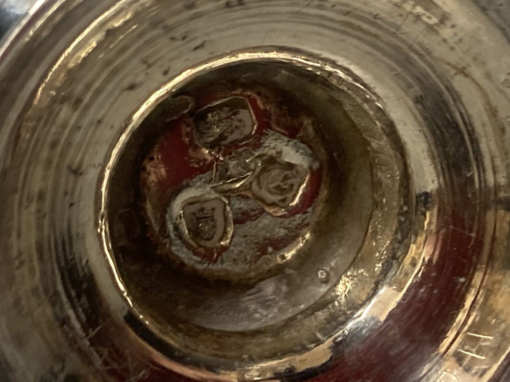 An early George III silver pepperette, with later embossed decoration, Samuel Wood?, London, 1760, 13.9cm, 111 grams.